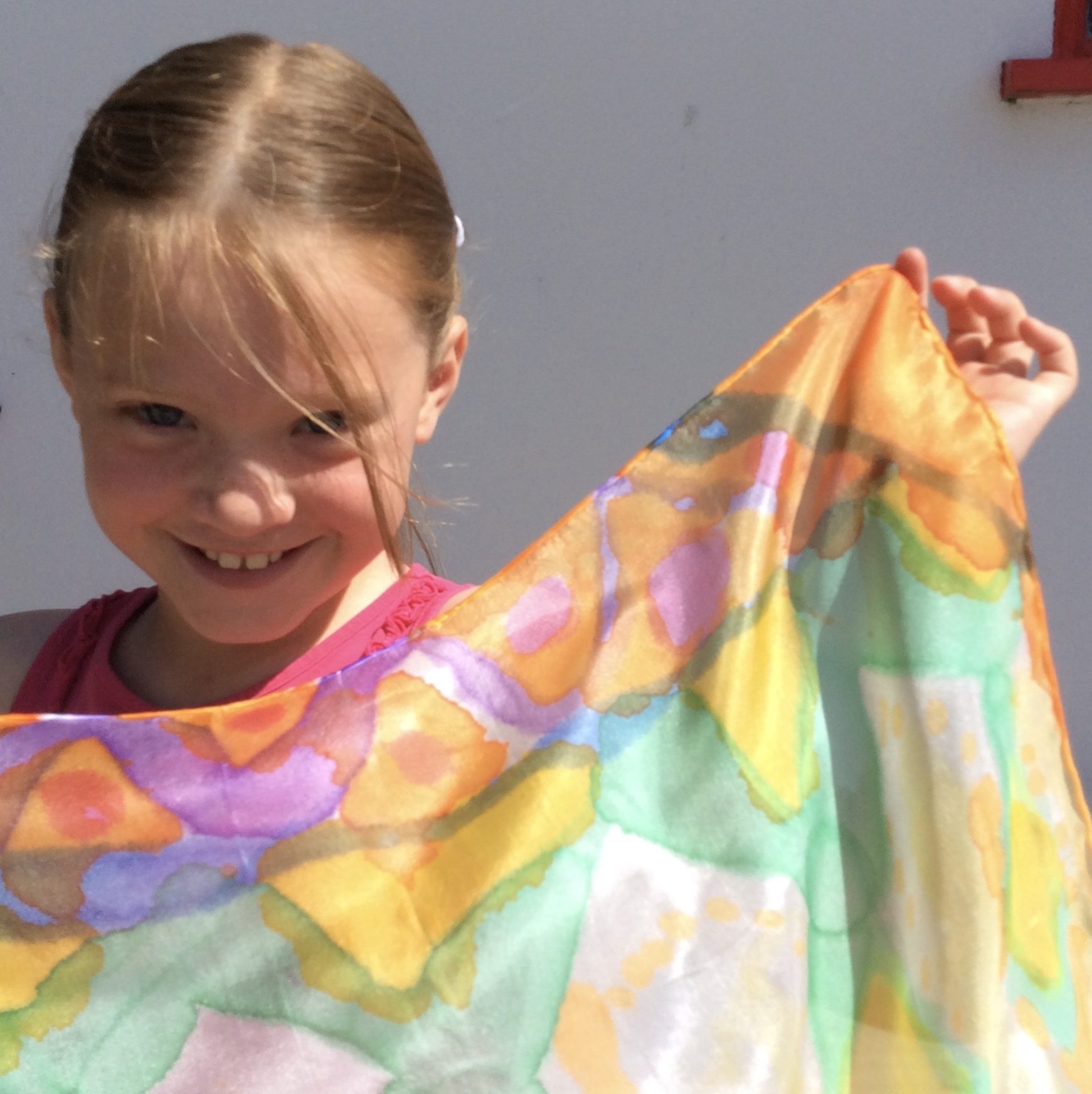 Young girl with her painted silk scarf